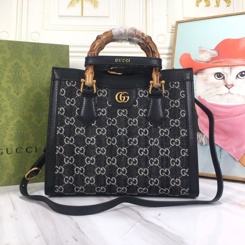 G*u*i top handle bags